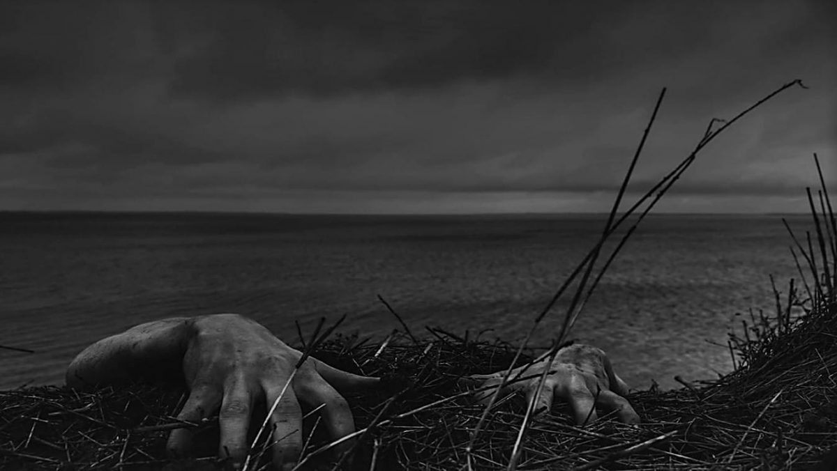 Malevolent Year 2022 - Zombie hands on dark beach